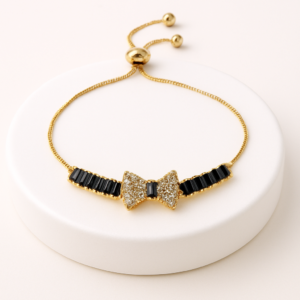 gold bow bracelet – bronze, pink & black