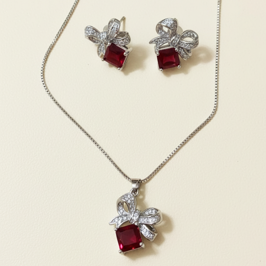 ruby bow necklace & earring set ruby bow necklace & earring set